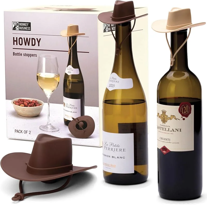 Visita la tienda de Monkey Business Monkey Business Howdy - Paquete de 2 tapones de vino con sombrero de vaquero, divertidos tapones de silicona para botellas que mantienen el vino fresco, accesorios de cocina novedosos y bonitos — Vino y mesa festiva