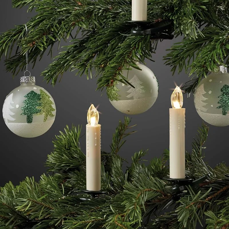 Visita la tienda de Hellum hellum Velas LED inalámbricas para árbol de Navidad, 20 unidades, blanco cálido con mando a distancia, color marfil, gotas de cera para interiores, funciona con pilas, 14 x 2 cm, guirnalda de luces — Luces Navidad