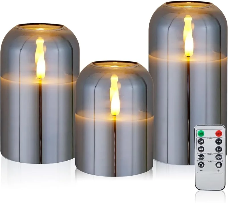 Visita la tienda de CCLIFE CCLIFE Velas eléctricas y LED de cera real con control remoto, función de temporizador, hechas de parafina, Funcionamiento con batería, Vidrio gris 3 Piezas — Luces Navidad