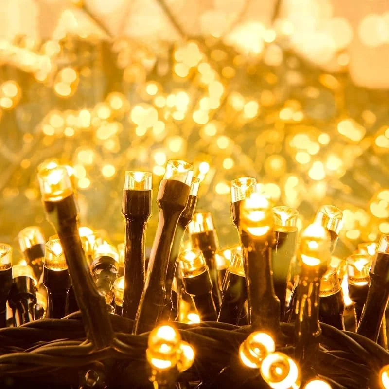 Visita la tienda de Quntis Quntis Luces Navidad Exterior 10M 100 LED, Blanca Cálida Luces Arbol Navidad Interior con 8 Modos Impermeable IP44 y Función Memoria, para Fiestas Jardín Balcón Boda