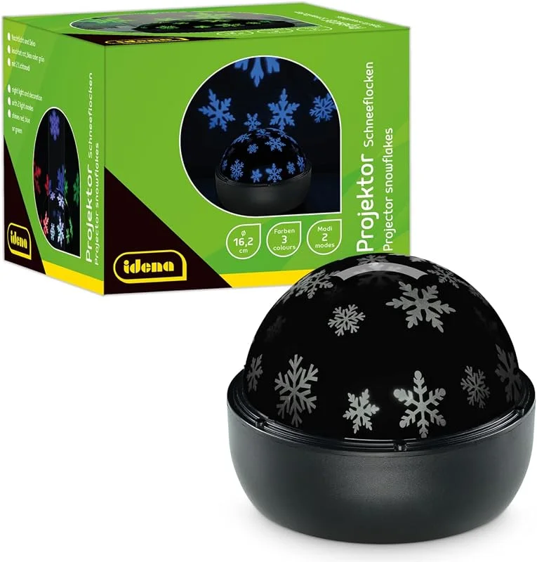 Visita la tienda de Idena Idena 50146 - Proyector LED copos de nieve, se ilumina en los colores rojo, verde y azul, proyector LED cielo estrellado con 2 modos, para uso en interiores, funciona con pilas, aprox. 16, 2 x 13 cm — Luces Navidad