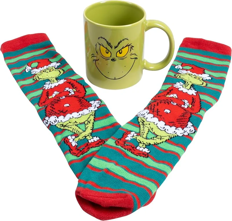 Fizz Creations Juego de taza y calcetines de The Grinch. Calcetines de Navidad y taza de cerámica con el Dr. Seuss's The Grinch. Relleno de calcetines. — Adviento y mesa
