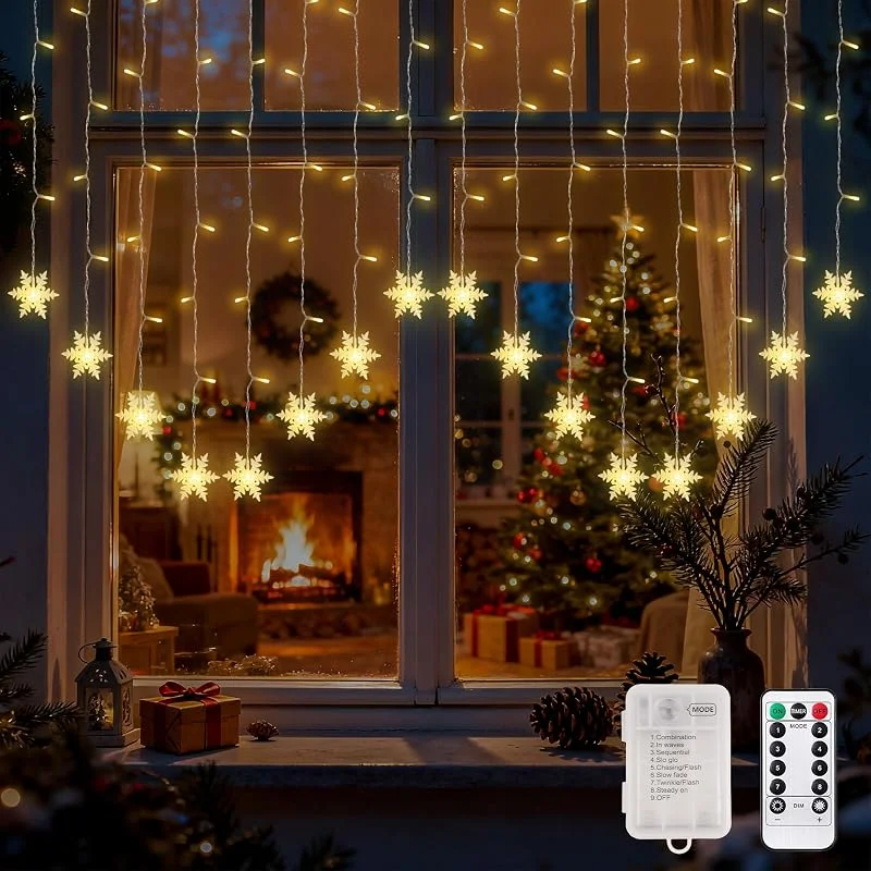 Visita la tienda de FemKey Cortina de Luces Navidad, 2x1M 104 LED Luces de Navidad Copo de Nieve 8 Modos Pilas, USB, IP44, Luces Cadena de Ventana Interior Exterior, Decoracion Navideñas Fiesta, Balcón