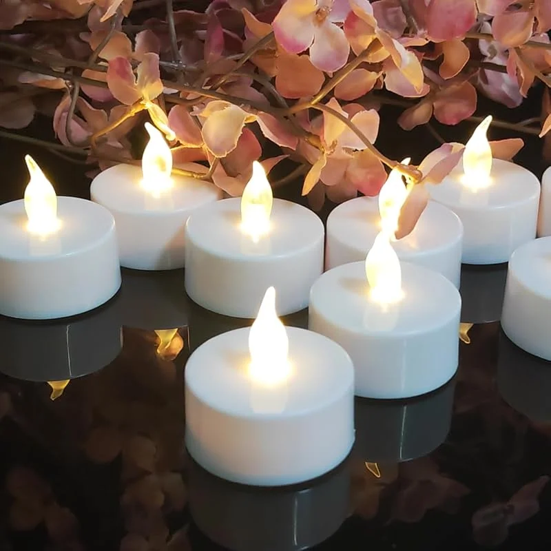 Jialine Velas de té LED sin llama, 12 unidades, pilas eléctricas, batería extra larga 200 horas para Navidad, bodas, fiestas (blanco cálido) — Cena a la luz de velas